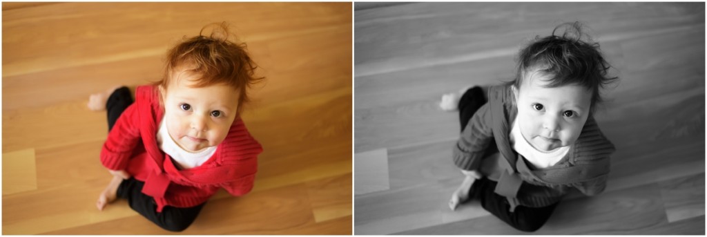Young girl sitting in hallway using natural light from door