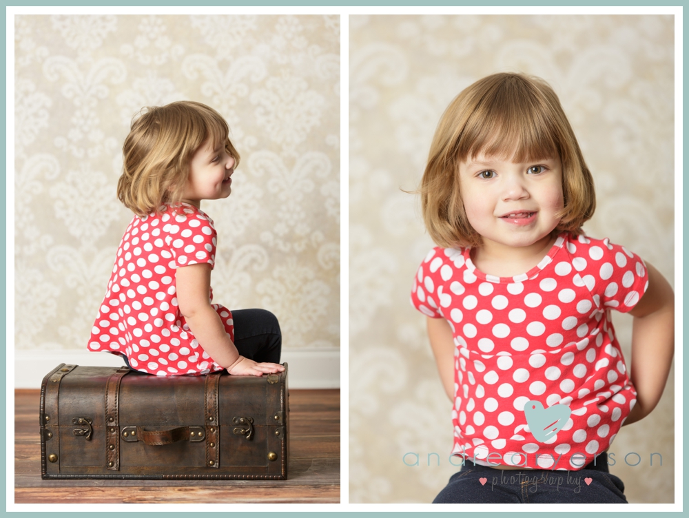Girl on vintage suitcase