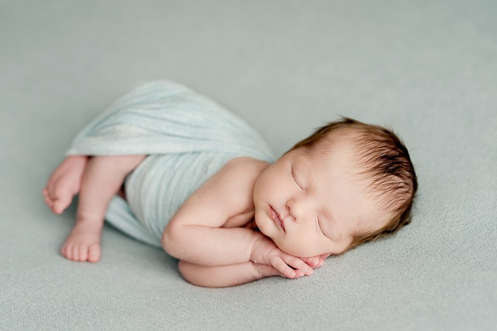 posed newborn photographer
