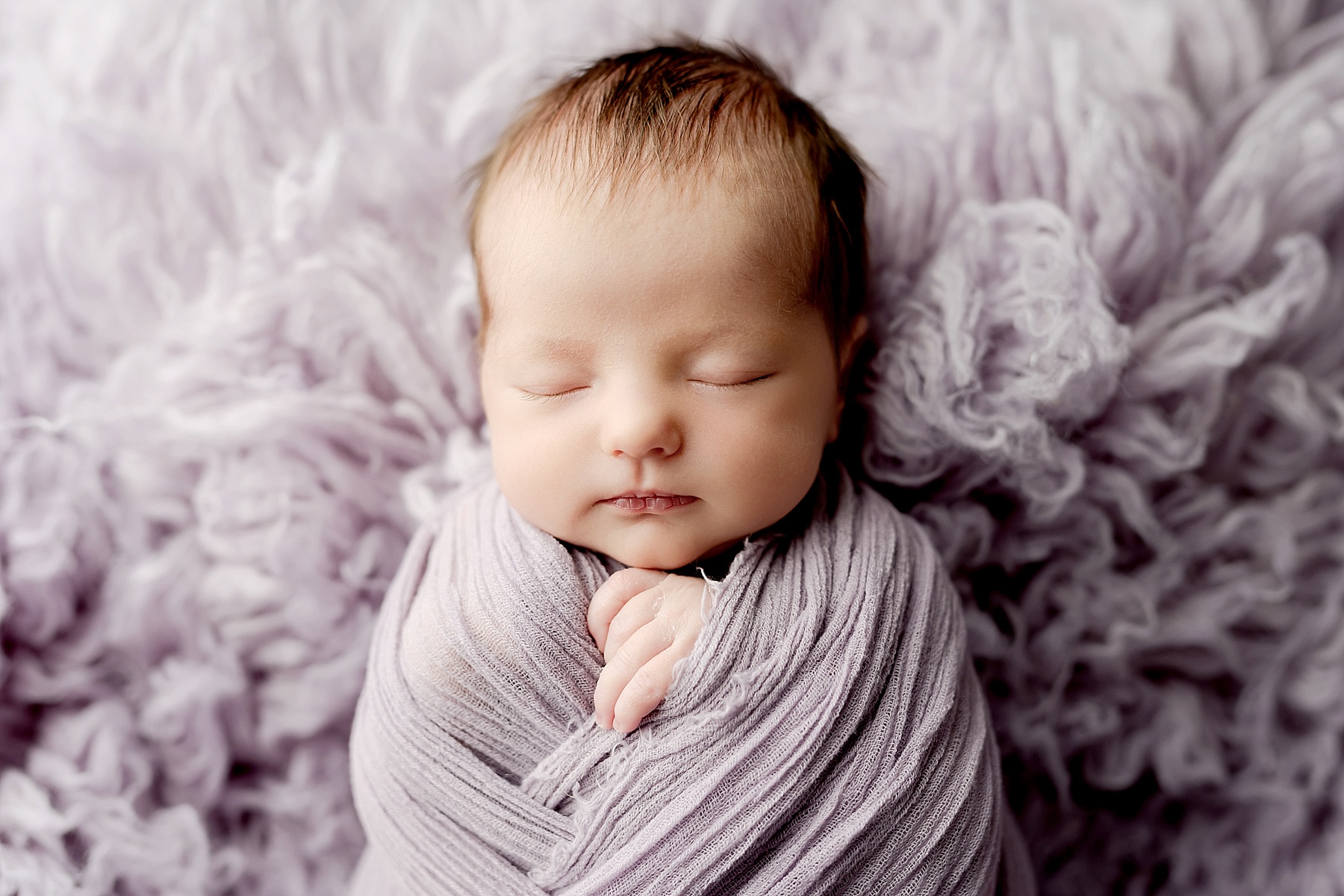 sleeping newborn baby photographer