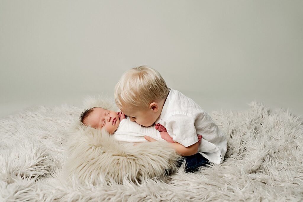 newborn with one year old brother