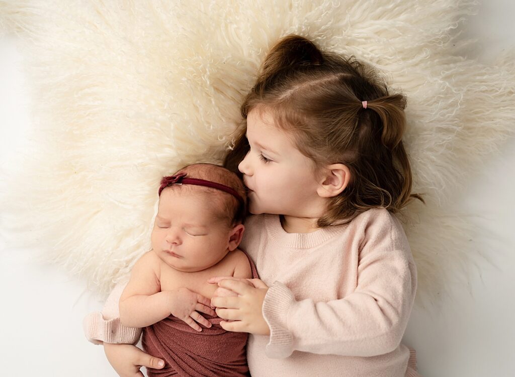 newborn and sister photo